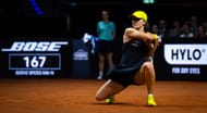 Iga Natalia Swiatek of Poland in action against Jana Fett of Croatia in the second round on Day 3 of the Porsche Tennis Grand Prix. Source: Getty