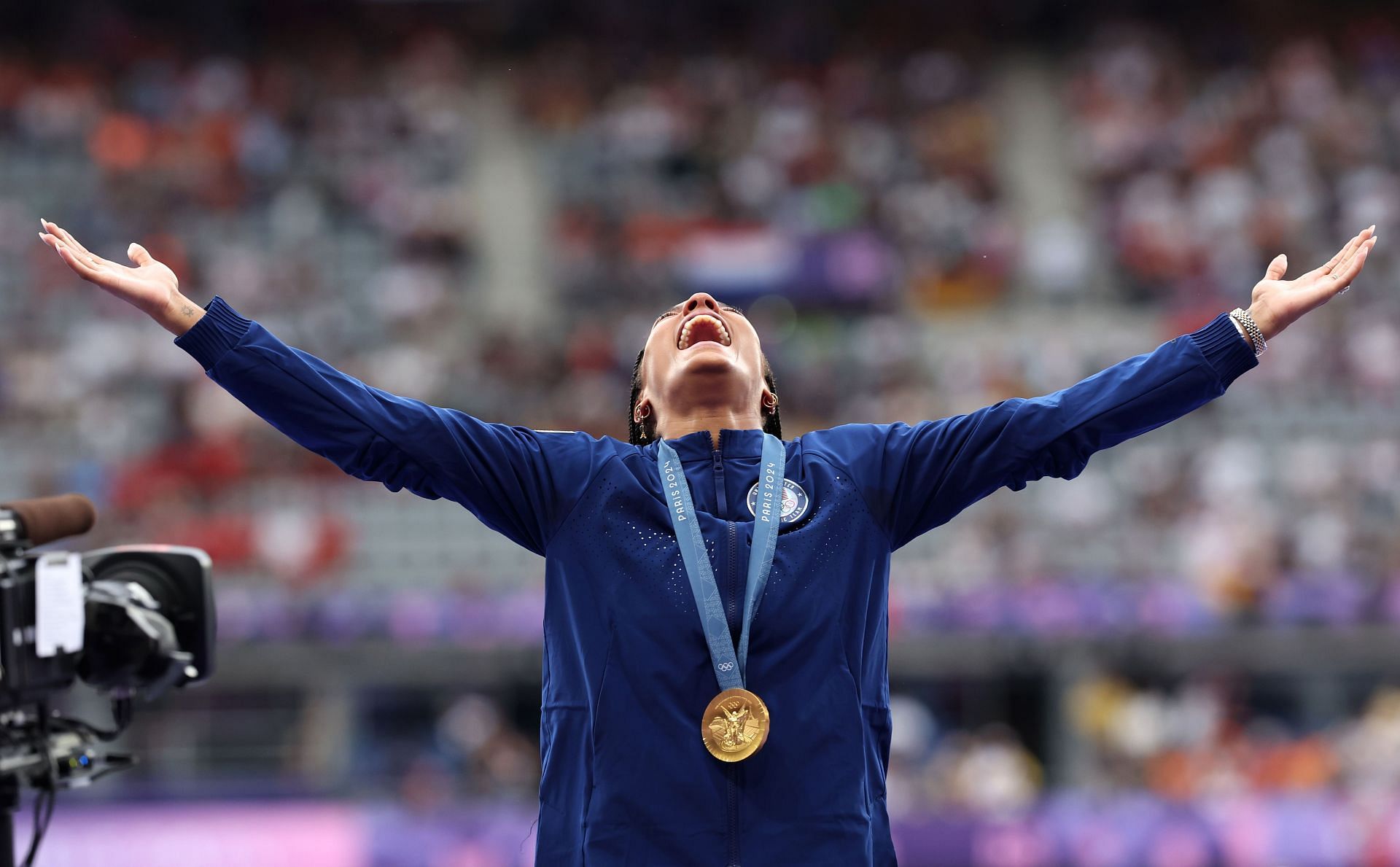 Tara Davis-Woodhall after winning the gold medal at the Paris Olympics [Image Source: Getty]
