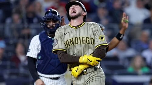 Jackson Merrill reacts after taking a hit from Devin Williams’ fastball.[Source: Imagn]