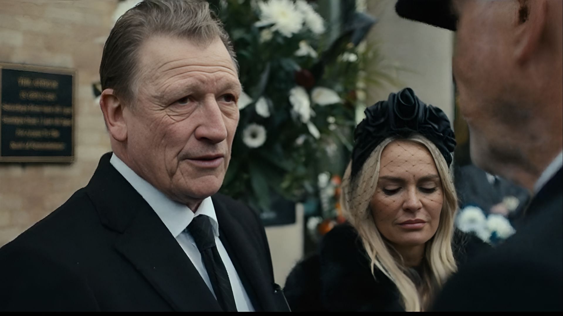In Mobland episode 5, Richie Stevenson puts on a composed face at Tommy&rsquo;s funeral, unaware that his wife Vron&rsquo;s fate is already sealed. (Image via Paramount)