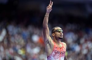 Grant Holloway and Vernon Norwood send mixed reactions to Andre De Grasse's World Athletics Relay Championship post