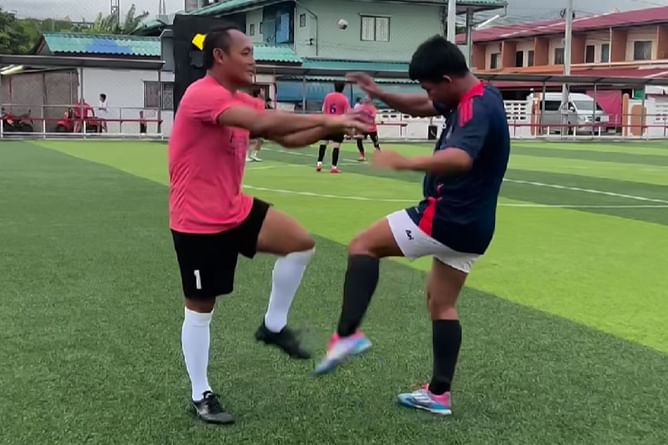WATCH: Thai legends Saenchai, Rodtang get a little too real with their Muay Thai drills while playing football