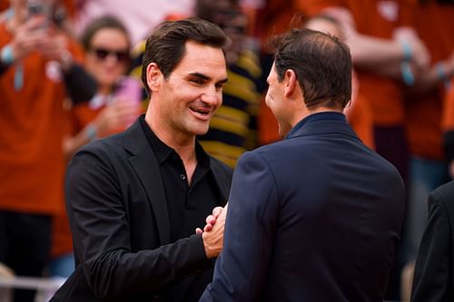 Roger Federer (left) greets Rafael Nadal (right) during the 2025 French Open tribute dedicated to the Spaniard (Source: Getty)