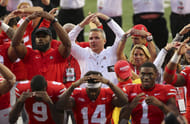 Urban Meyer and wife Shelley celebrate with the team - Source: Imagn