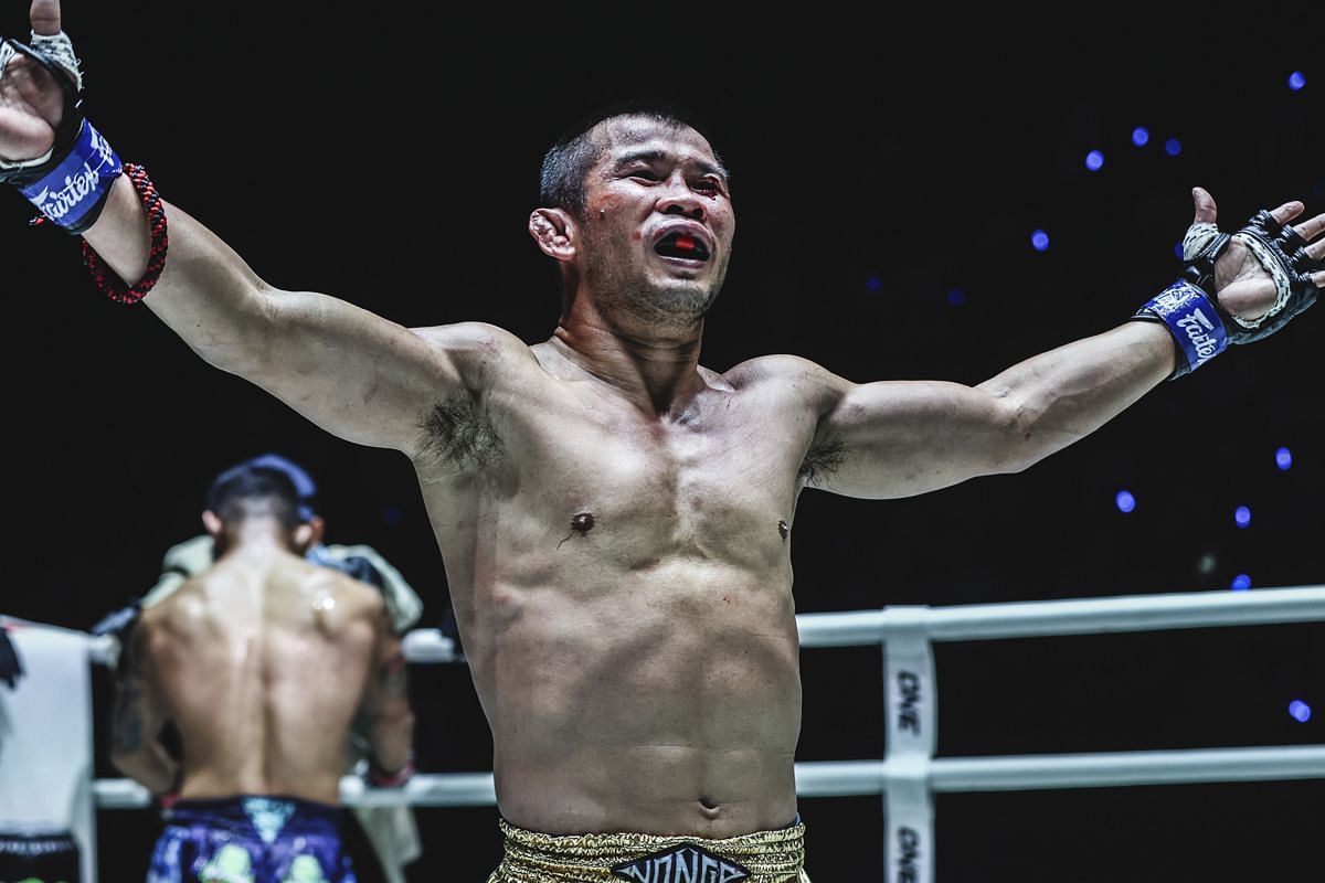 Nong-O spreads his arms in the Circle