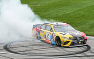 Kyle Busch (18) celebrates with a burnout after winning the Buschy McBusch Race 400 at Kansas Speedway, May 2nd 2021 - Source: Imagn