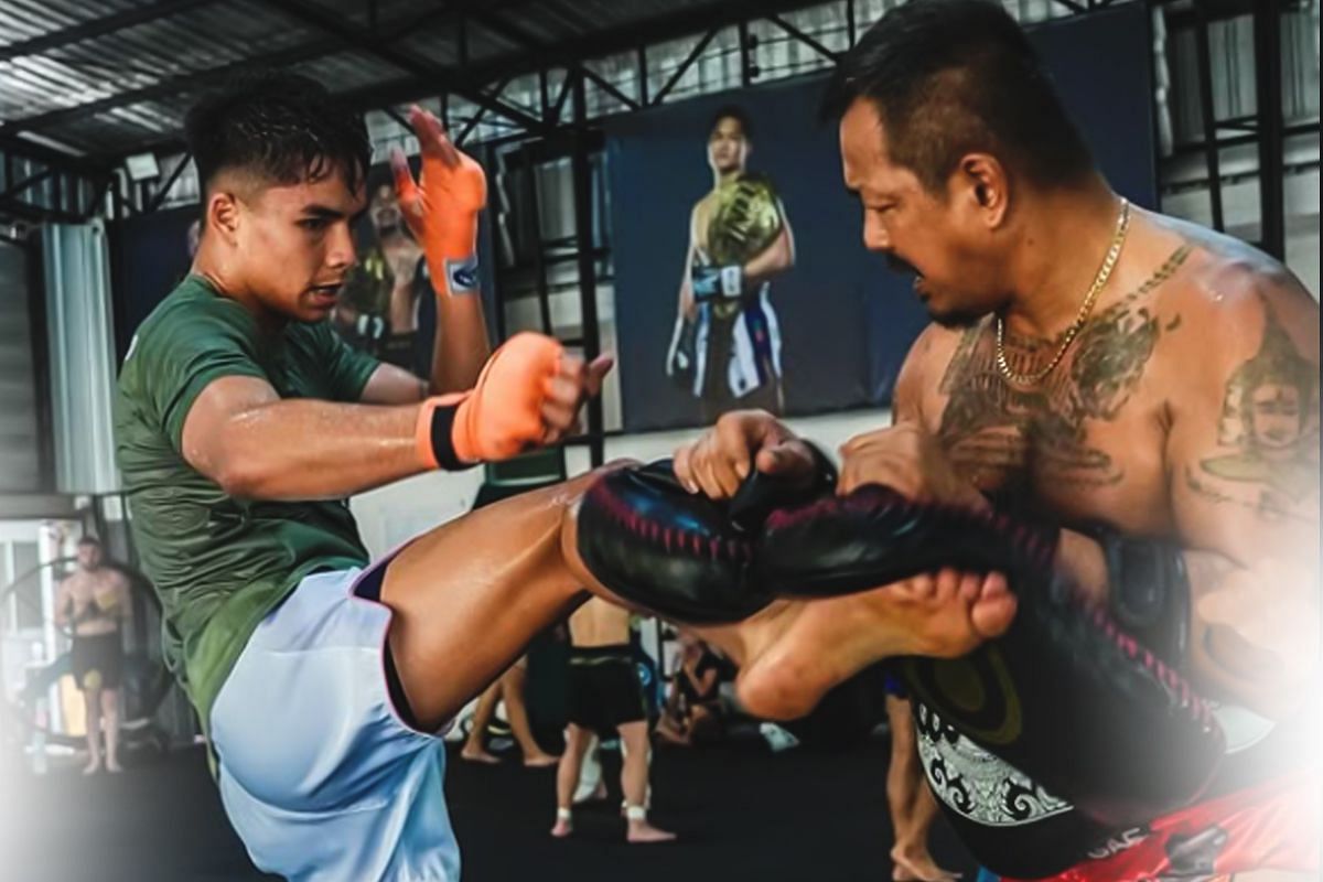 Johan Ghazali (left) working on his kicks with Trainer Gae (right) [Photo via: ONE Championship]