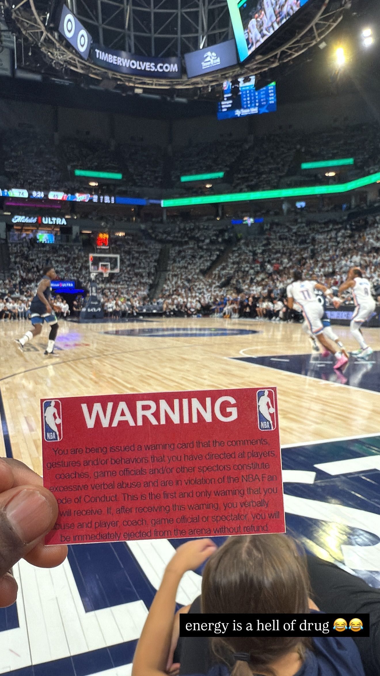 John Letellus reacts to being warned during Timberwolves game