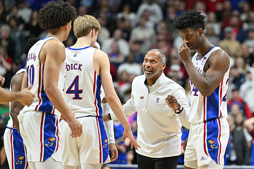 Norm Roberts gives instructions to his Kansas Jayhawks players. (Credits: IMAGN)