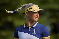 Charley Hull sports a yellow and blue outfit on the range ahead of the U.S. Women's Open 2025