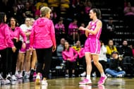 Caitlin Clark, right, talks with head coach Lisa Bluder - Source: Imagn