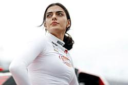 Toni Breidinger rocks crop top and jeans amid rain halting qualifying and practice