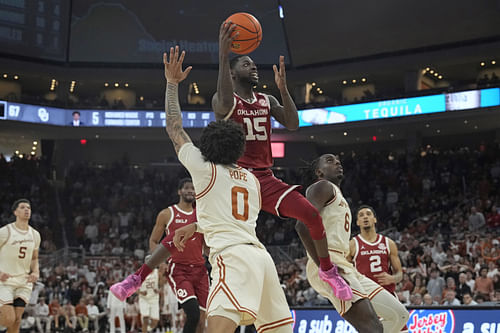 Oklahoma Sooners guard Duke Miles (#15) drives to the basket against Texas Longhorns guard Jordan Pope (#0) during the second half at Moody Center. Photo: Imagn