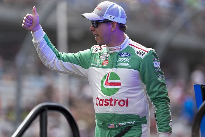 RFK reacts with playful regret as Brad Keselowski’s sleeveless hero cards slip into fans' hands