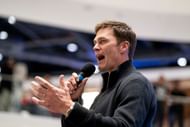 NFL legend Tom Brady speaks at an event. (Credits: IMAGN)