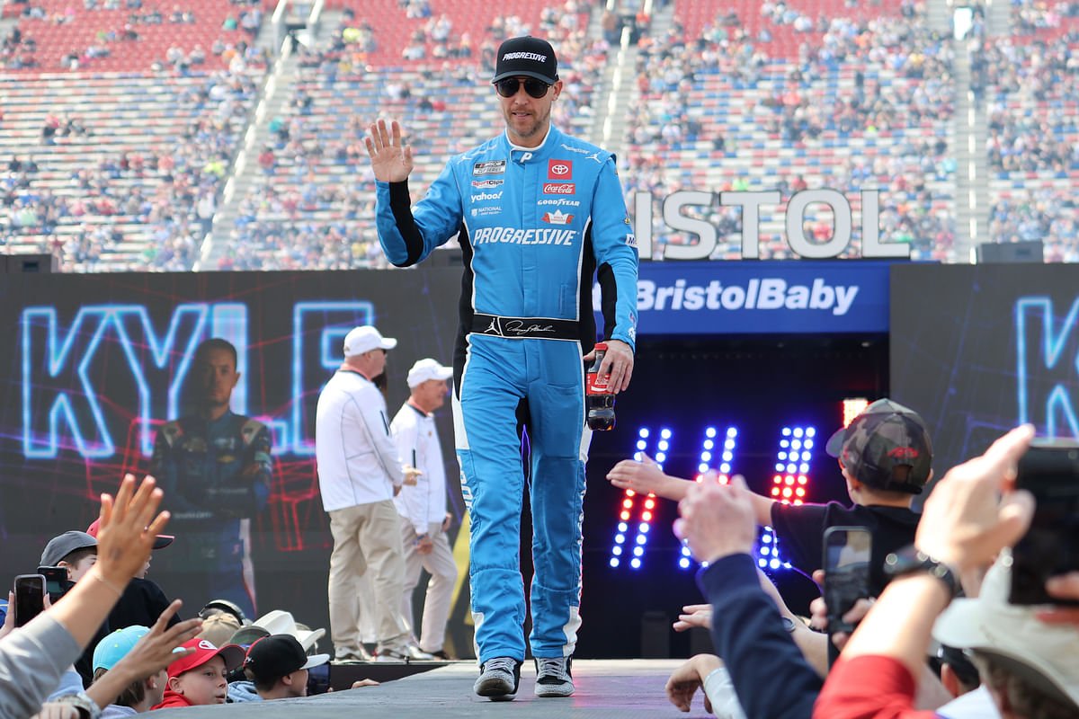 In Photo: Denny Hamlin saddles up in classic Texas cowboy style
