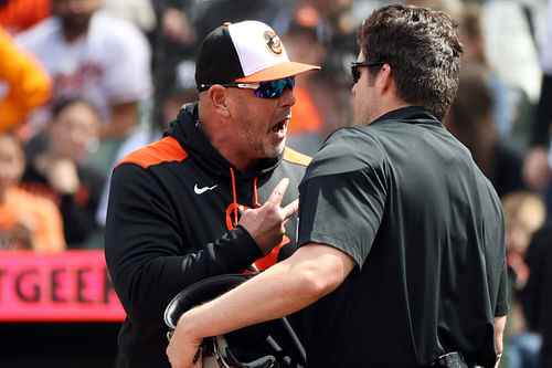 Baltimore Orioles - Brandon Hyde and John Bacon (Photo via IMAGN)