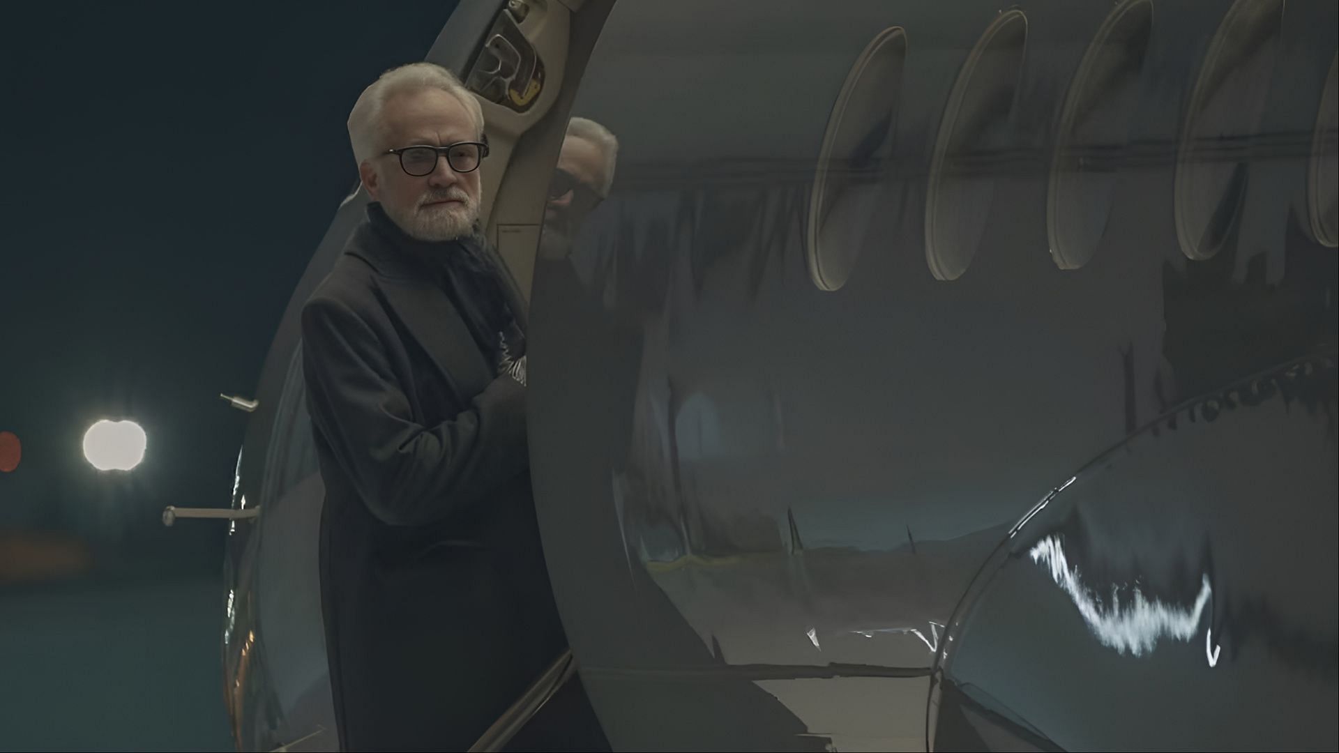 The Handmaid&rsquo;s Tale season 6 shows Commander Lawrence boarding the plane in a pivotal moment of episode 9. (Image via Hulu)