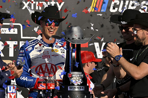 NASCAR Cup Series driver Joey Logano with the winner’s trophy at Texas Motor Speedway. Source: Imagn
