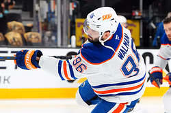 Oilers' Jake Walman buys young fans boxes of Upper Deck hockey cards after bumping into them at Walmart