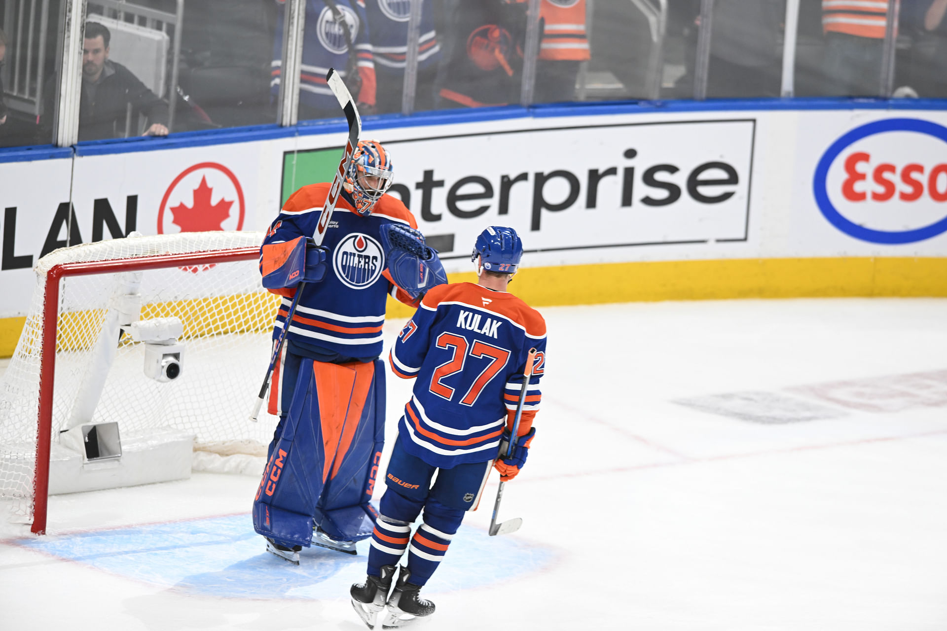 May 12, 2025; Edmonton, Alberta, CAN; Edmonton Oilers goalie Stuart Skinner (74) celebrates their win with defenseman Brett Kulak (27) over the Las Vegas Golden Knights during the third period in game three of the second round of the 2025 Stanley Cup Playoffs at Rogers Place. Mandatory Credit: Walter Tychnowicz-Imagn Images - Source: Imagn