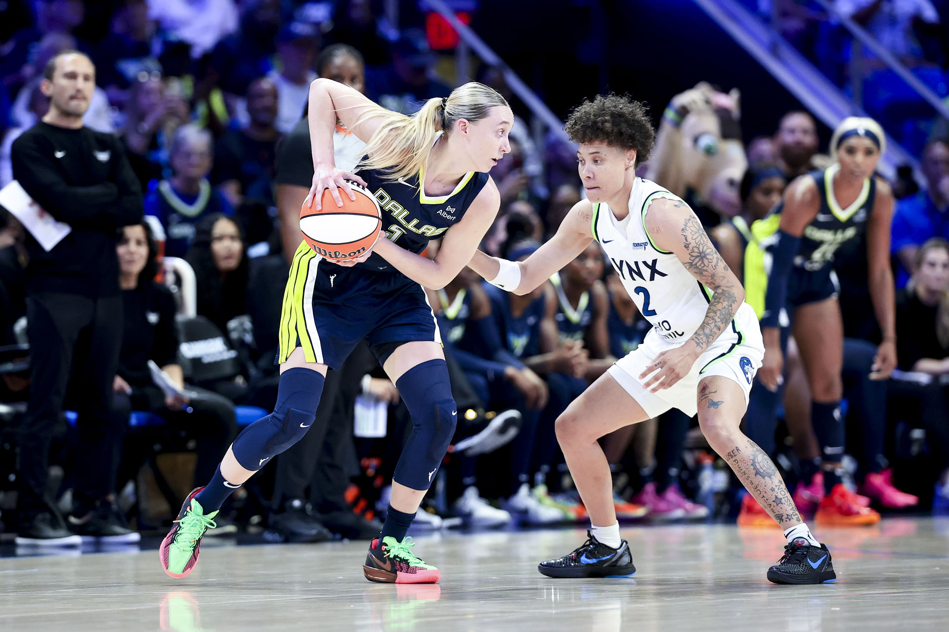 Dallas Wings guard Paige Bueckers (#5) looks to score as Minnesota Lynx guard Natisha Hiedeman (#2) defends during the first half of their WNBA clash at College Park Center. Photo: Imagn