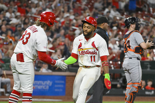 St. Louis Cardinals center fielder Victor Scott II (11) is congratulated by second baseman Brendan Donovan (33) after scoring against the Detroit Tigers during the seventh inning at Busch Stadium. Mandatory Credit: Jeff Curry-Imagn Images - Source: Imagn