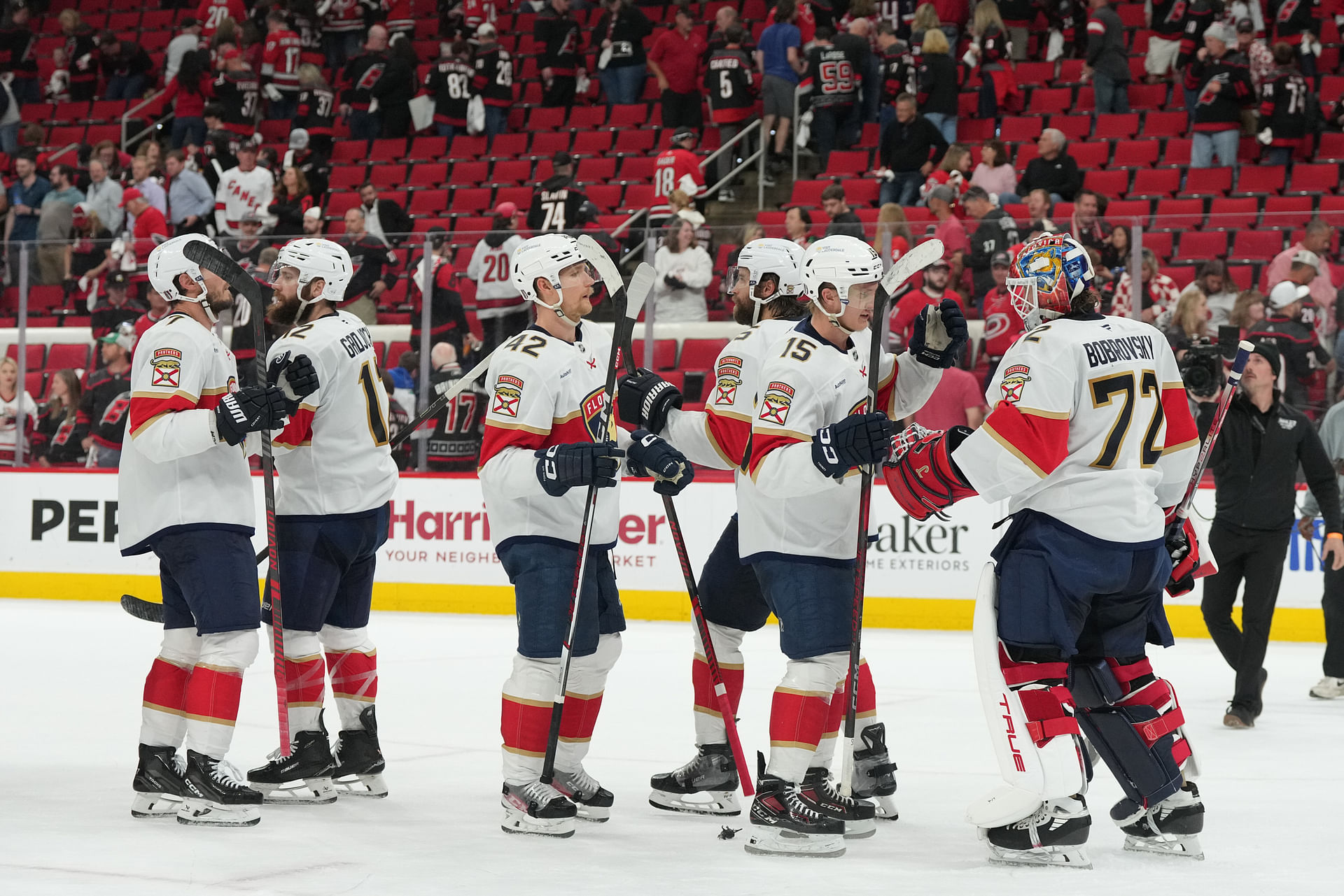 May 20, 2025; Raleigh, North Carolina, USA; Florida Panthers celebrate the win against the Carolina Hurricanes after the the third period in game one of the Eastern Conference Final of the 2025 Stanley Cup Playoffs at Lenovo Center. Mandatory Credit: James Guillory-Imagn Images - Source: Imagn