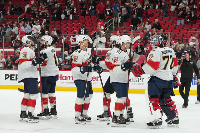 May 20, 2025; Raleigh, North Carolina, USA; Florida Panthers celebrate the win against the Carolina Hurricanes after the the third period in game one of the Eastern Conference Final of the 2025 Stanley Cup Playoffs at Lenovo Center. Mandatory Credit: James Guillory-Imagn Images - Source: Imagn