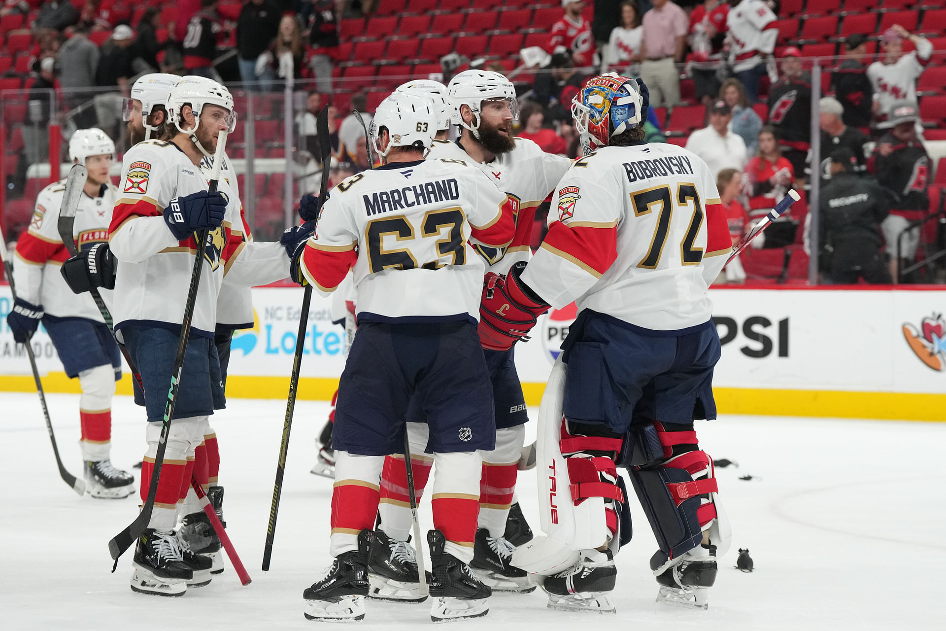 May 22, 2025; Raleigh, North Carolina, USA; Florida Panthers celebrate the win against the Carolina Hurricanes in game two of the Eastern Conference Final of the 2025 Stanley Cup Playoffs at Lenovo Center. Mandatory Credit: James Guillory-Imagn Images - Source: Imagn