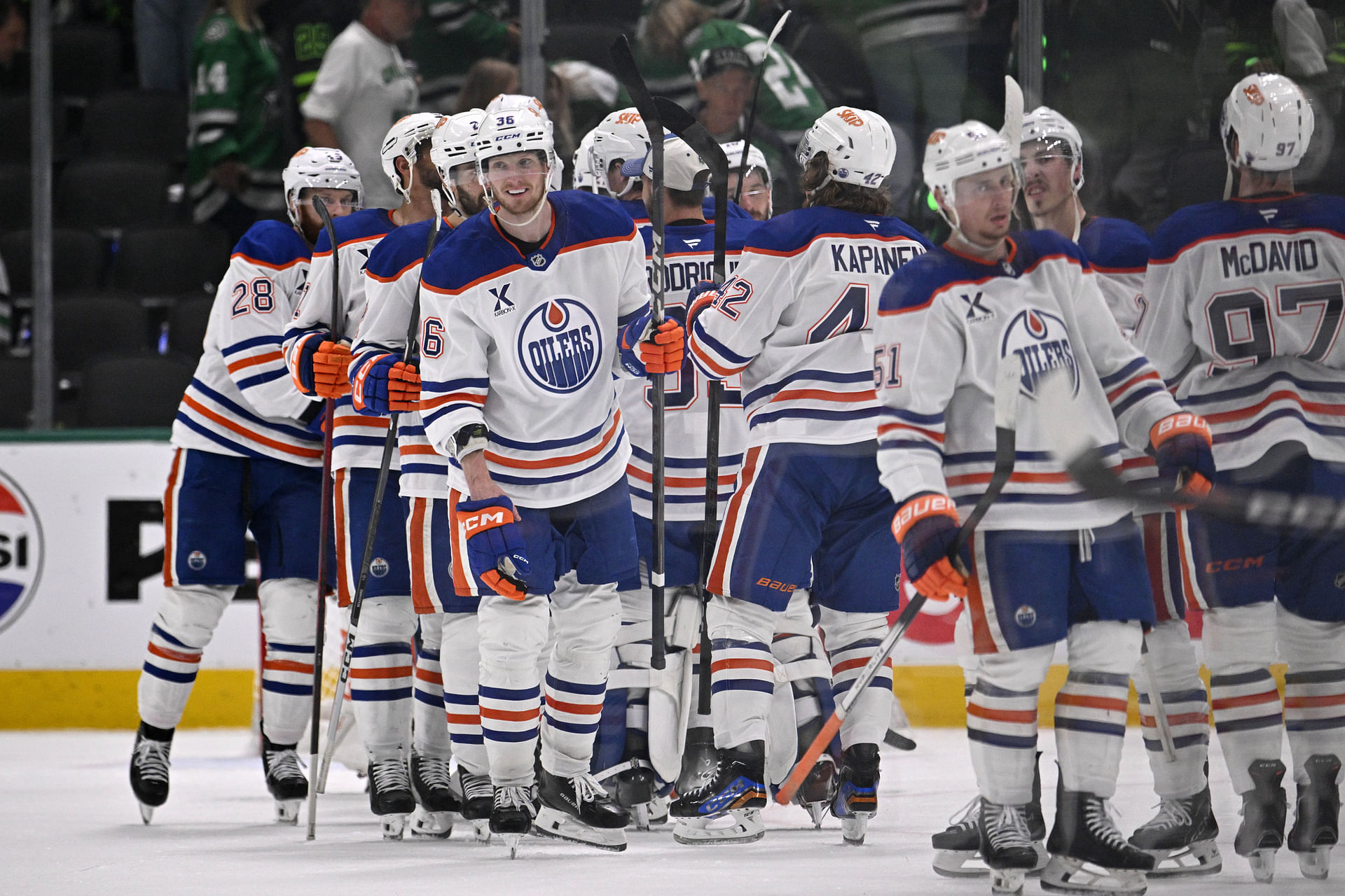 May 23, 2025; Dallas, Texas, USA; Edmonton Oilers defenseman John Klingberg (36) and teammates react after defeating the Dallas Stars in game two of the Western Conference Final of the 2025 Stanley Cup Playoffs at American Airlines Center. Mandatory Credit: Jerome Miron-Imagn Images - Source: Imagn
