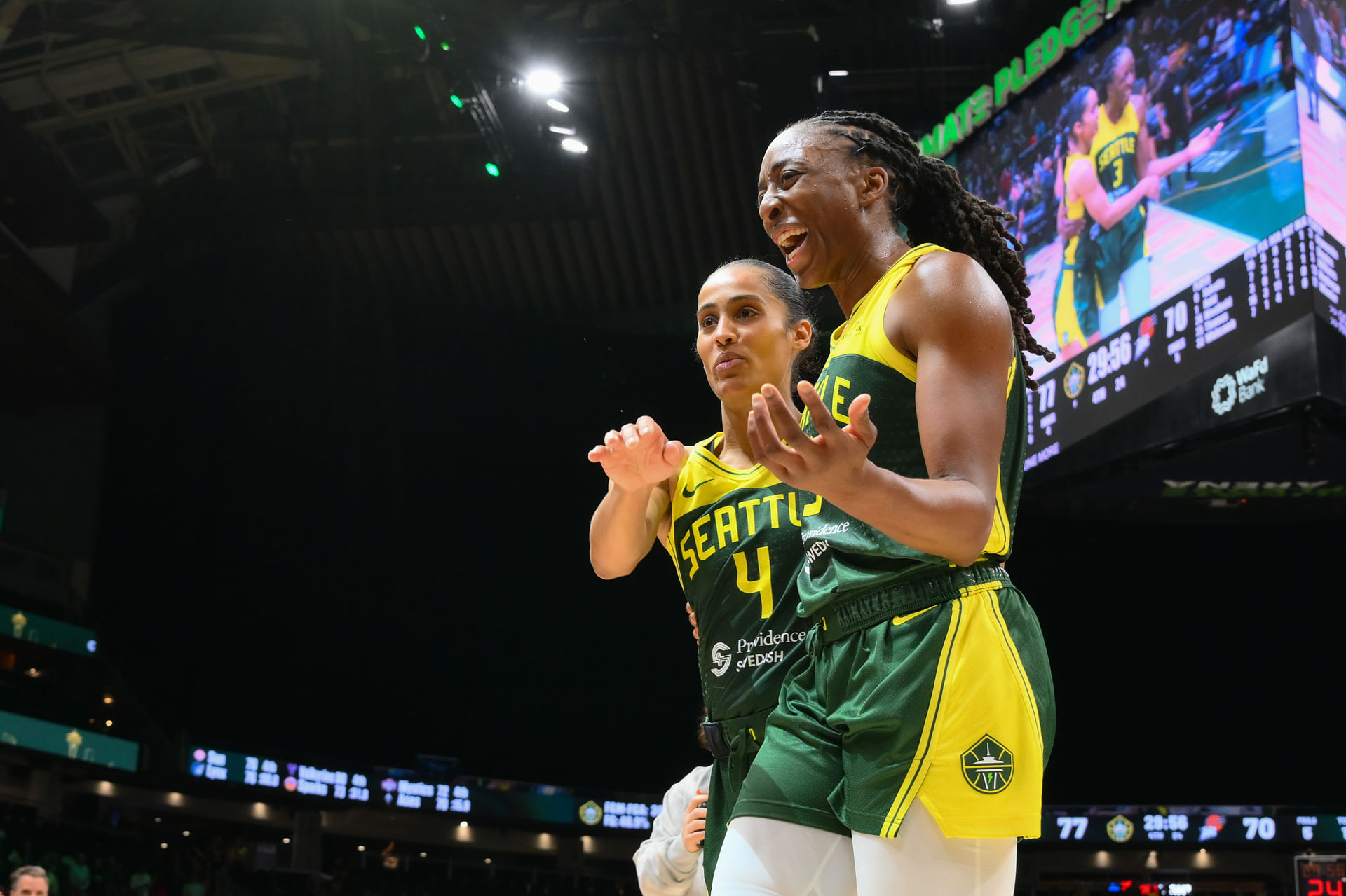 May 23, 2025; Seattle, Washington, USA; Seattle Storm guard Skylar Diggins (4) and forward Nneka Ogwumike (3) celebrate after defeating the Phoenix Mercury at Climate Pledge Arena. Mandatory Credit: Steven Bisig-Imagn Images - Source: Imagn