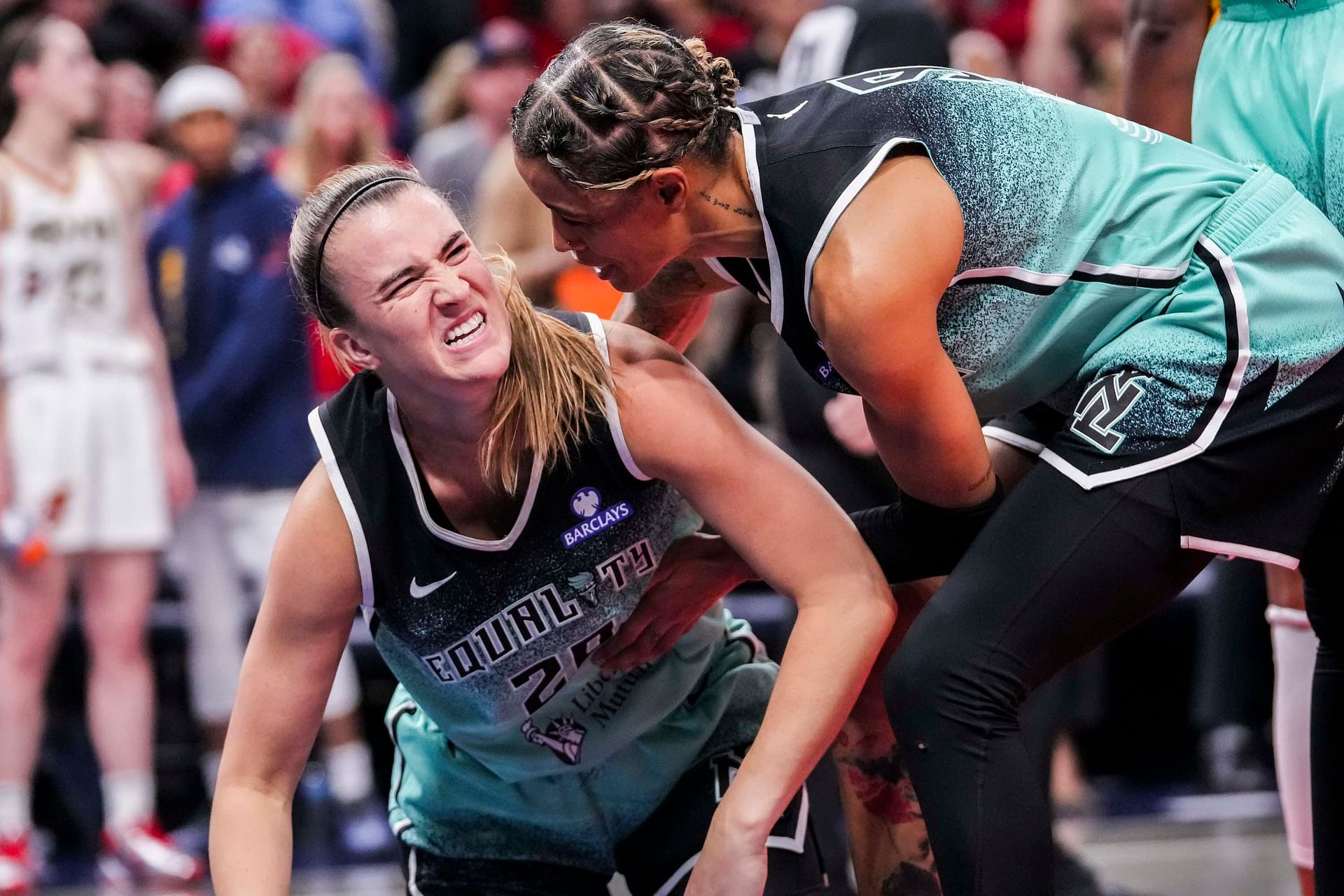 New York Liberty guard Sabrina Ionescu (20) and New York Liberty guard Natasha Cloud (9) celebrate Saturday, May 24, 2025, during a game between the Indiana Fever and the New York Liberty at Gainbridge Fieldhouse in Indianapolis. The New York Liberty defeated the Indiana Fever, 90-88. - Source: Imagn