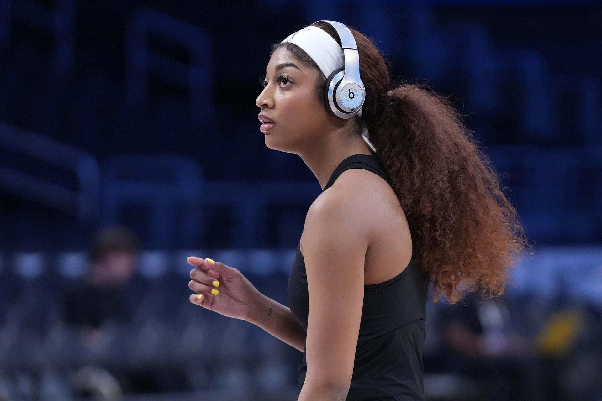 May 25, 2025; Los Angeles, California, USA; Chicago Sky forward Angel Reese wears Beats by Dre studio pro headphones before the game against the LA Sparks at Crypto.com Arena. Mandatory Credit: Kirby Lee-Imagn Images - Source: Imagn