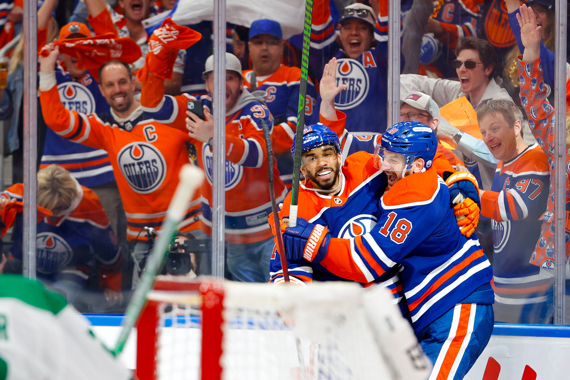May 25, 2025; Edmonton, Alberta, CAN; Edmonton Oilers left wing Evander Kane (91) and left wing Zach Hyman (18) celebrates a goal scored by Hyman against the Dallas Stars during the third period in game three of the Western Conference Final of the 2025 Stanley Cup Playoffs at Rogers Place. Mandatory Credit: Perry Nelson-Imagn Images - Source: Imagn