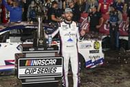 NASCAR Cup Series driver Ross Chastain (1) celebrates his win during the Coca Cola 600 at Charlotte Motor Speedway - Source: Imagn