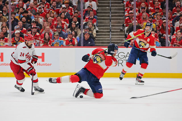 May 26, 2025; Sunrise, Florida, USA; Florida Panthers center Sam Bennett (9) attempts a shot on goal during the third period against the Carolina Hurricanes in game four of the Eastern Conference Final of the 2025 Stanley Cup Playoffs at Amerant Bank Arena. Mandatory Credit: Sam Navarro-Imagn Images - Source: Imagn