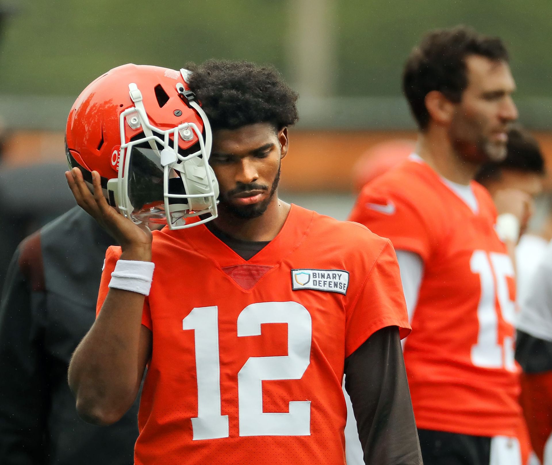 Cleveland Browns quarterback Shedeur Sanders (12) listens to the play calling on the sideline during an NFL practice at the Cleveland Browns training facility on Wednesday, May 28, 2025, in Berea, Ohio. - Source: Imagn