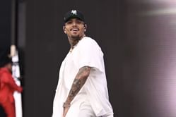 Why was Chris Brown arrested in Manchester? Bottle attack on music producer at a London nightclub explored