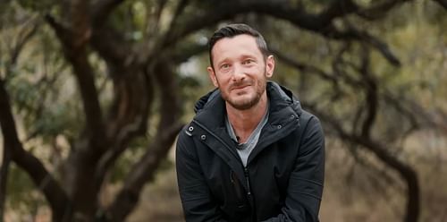 The documentary explores the journey of Gareth Thomas rescuing a Pangolin and preparing it for the wilderness (Image via Netflix)
