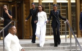 Diddy's twin daughters Jessie and D'Lila swept off their feet by their dates at their high school prom