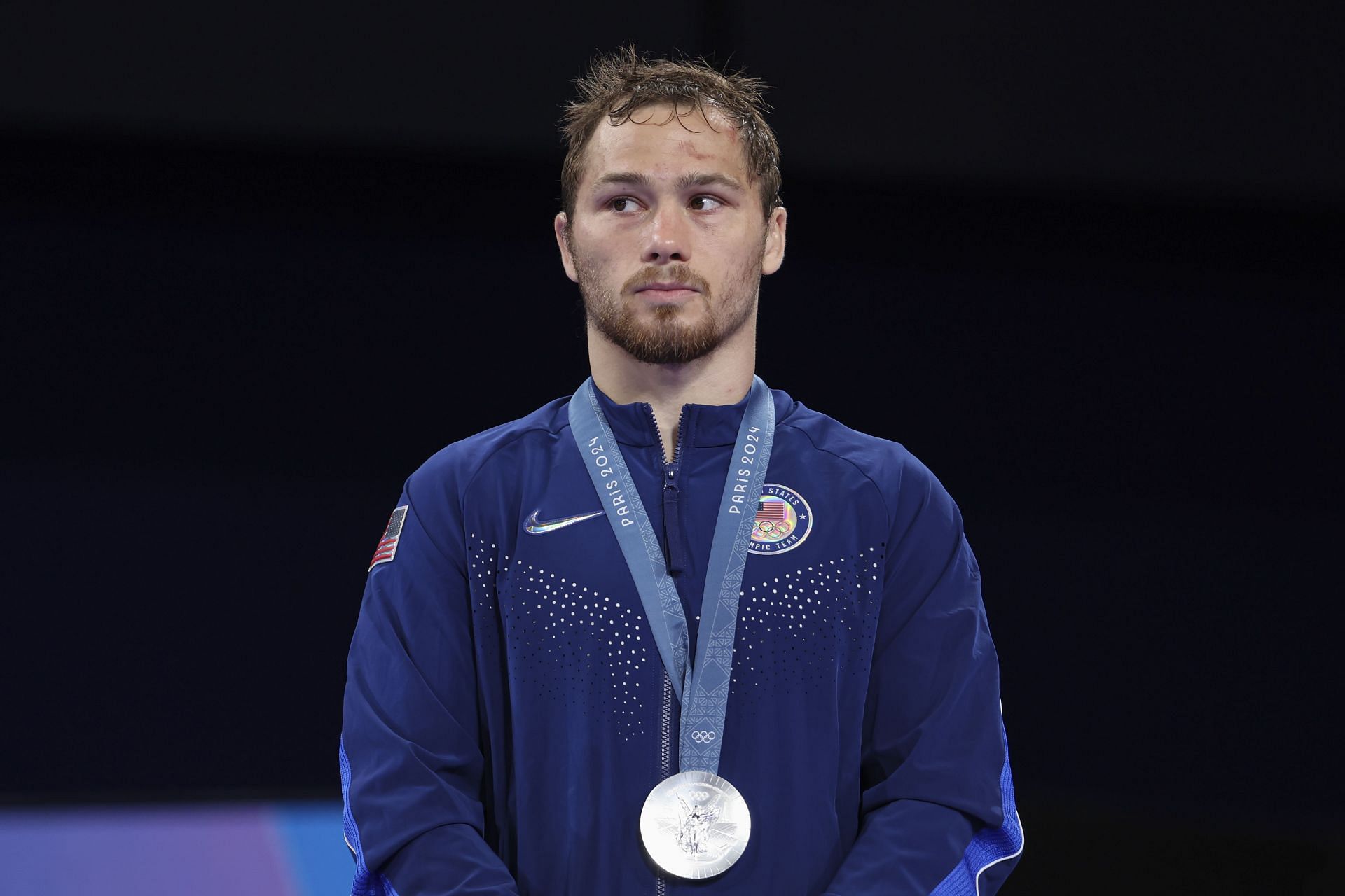 Spencer Lee with the silver medal from the Paris Olympics [Image Source: Getty]