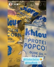 Kiyan Anthony's mom, La La Anthony, shouts out Khloé Kardashian as she tries out flavors from her viral protein popcorn venture. (Image via Instagram @lala)