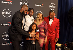 LeBron James hypes his "twin" Bryce James as he jams around with Savannah James and Zhuri in background