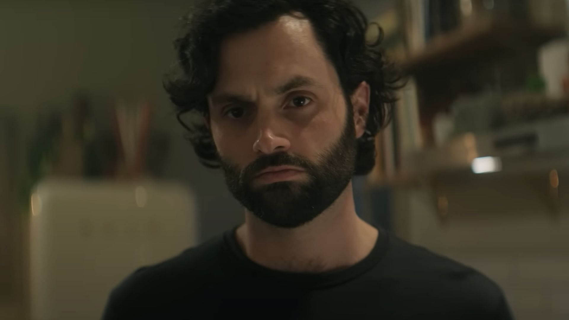 Badgley as Joe Goldberg (Image via YouTube/Netflix)