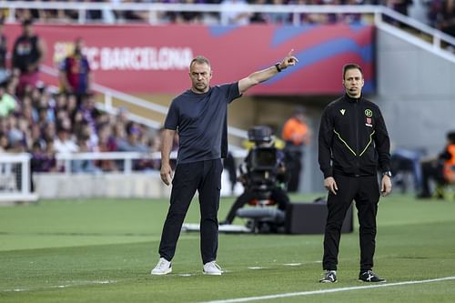 Barcelona boss Hansi Flick (left)