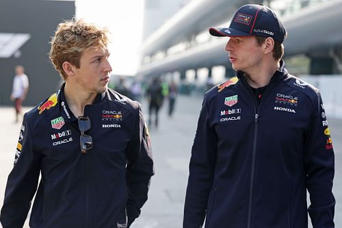 Liam Lawson and Max Verstappen walk in the Paddock at Shanghai International Circuit. Source: Getty