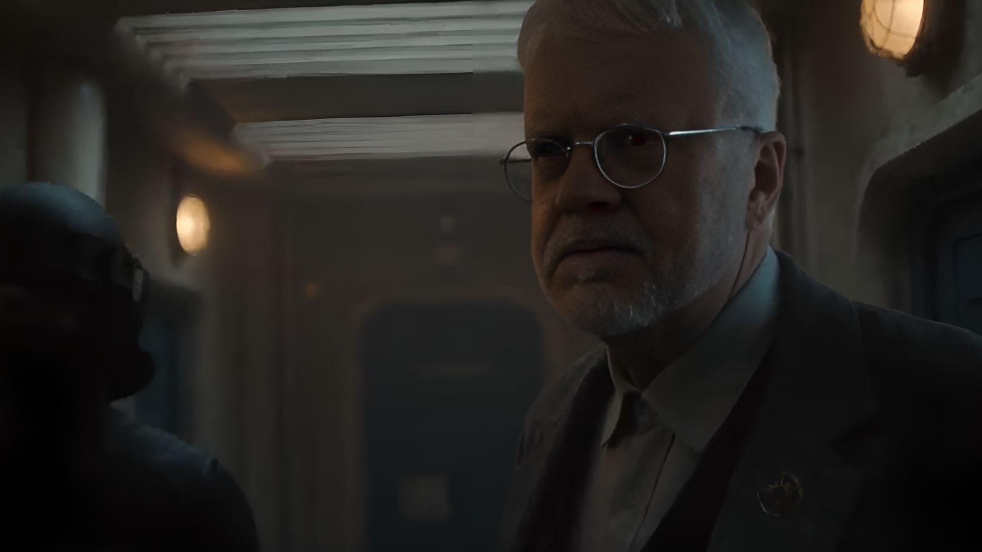 Tim Robbins as Bernard Holland, whose fate was left unresolved at the end of season 2. His confrontation with Juliette in the airlock will have consequences in Silo season 3. (Image via AppleTv)