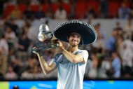 Machac with a trophy in the Mexican Open 2025 - Final - Source: Getty