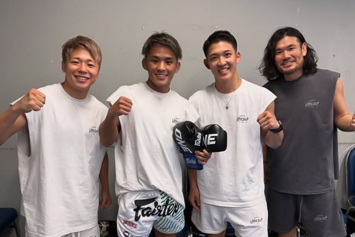Team Vasileus smiles at the camera
